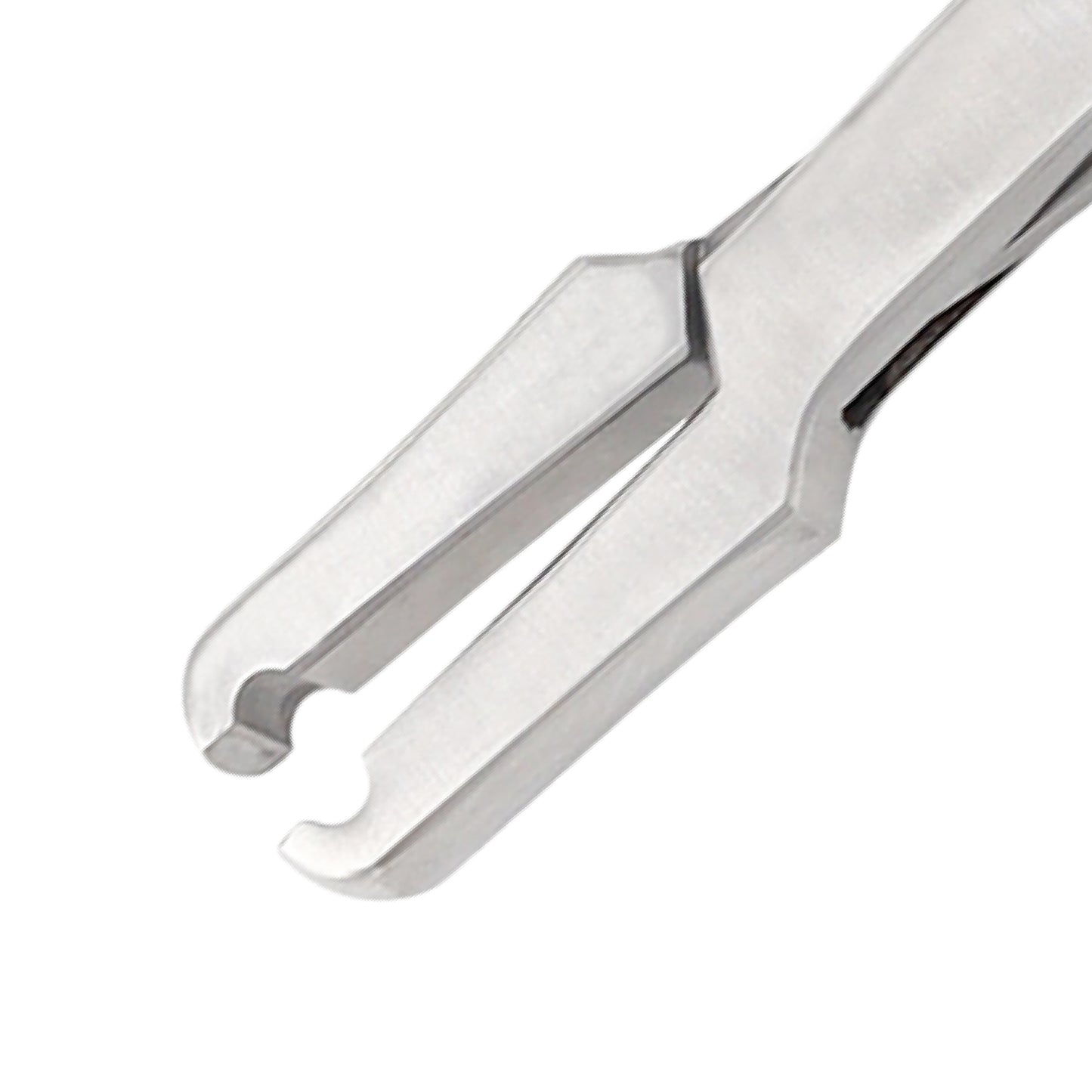 Close-up view of the stainless steel jaw mechanism of a VITALITEC titanium hemostatic clip applier showing internal grooves for securing surgical clips.