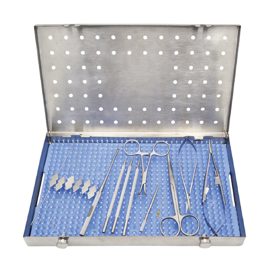 A 17-piece probing and syringing kit with stainless steel instruments, including scissors, a hook, dilators, a clamp, a needle holder, probes, and a cannula, arranged neatly in an open metal tray with silicone padding.