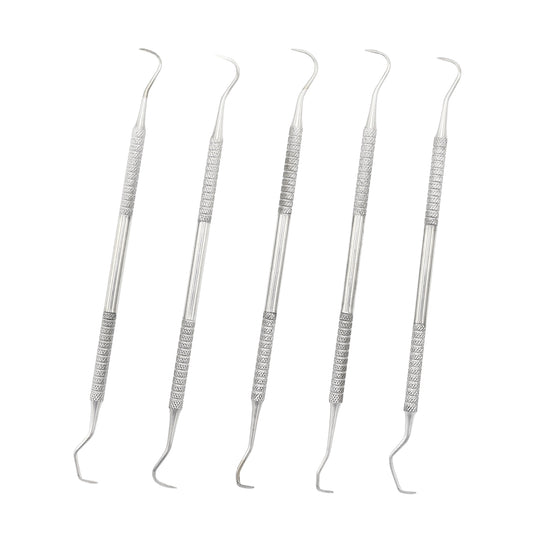 A set of five stainless steel carving knives with ergonomic handles, designed for dental scaling and shaping.