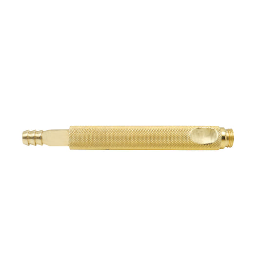 Gold-colored tool on a white background
