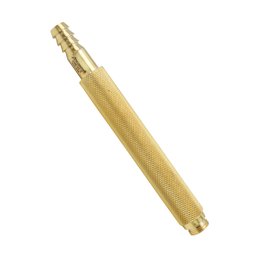 Gold-colored tool on a white background