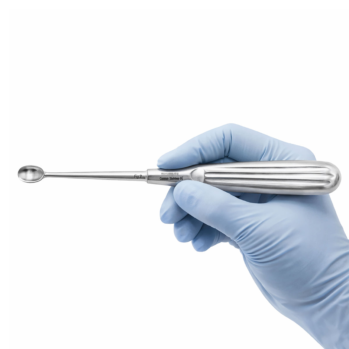 Hand holding a metal tool with a gloved hand on a white background