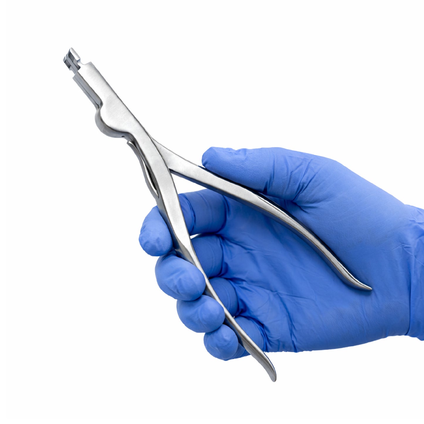 Hand wearing a blue glove holding a metal medical tool on a white background