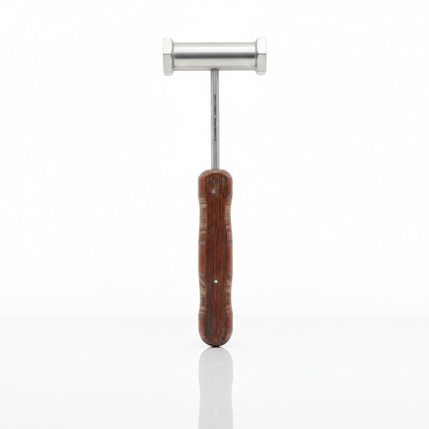 Metal tool with wooden handle on a white background
