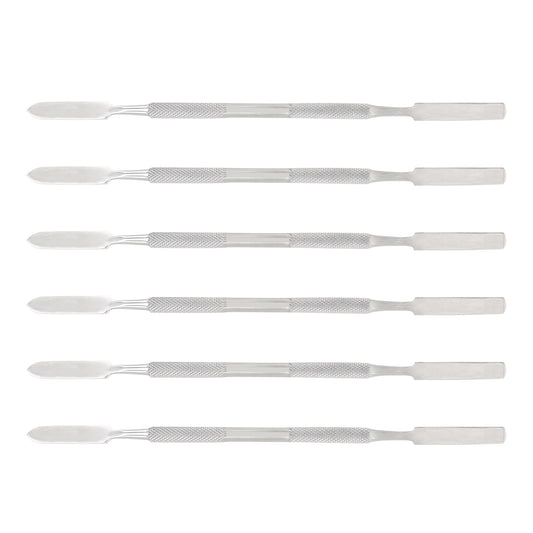 Set of six metal tools with textured handles on a white background