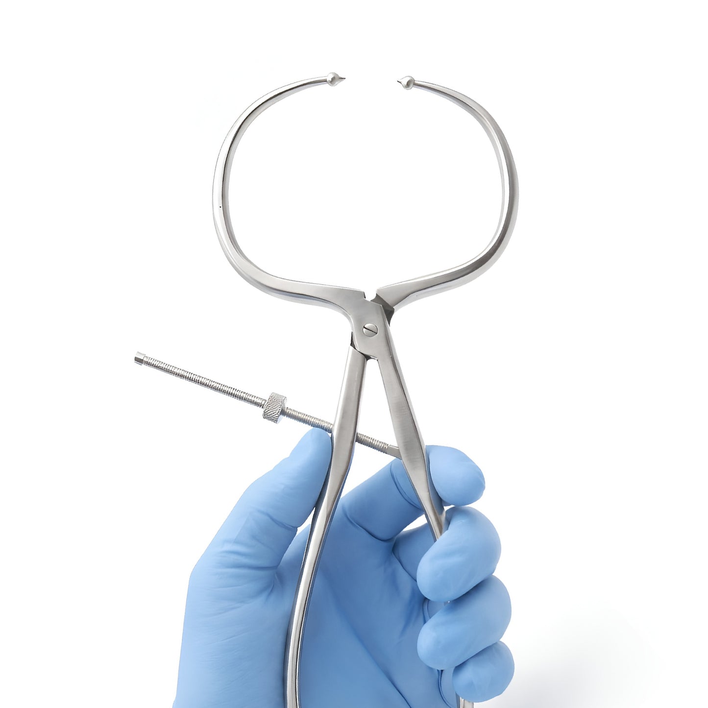 Surgical forceps held by a gloved hand on a white background