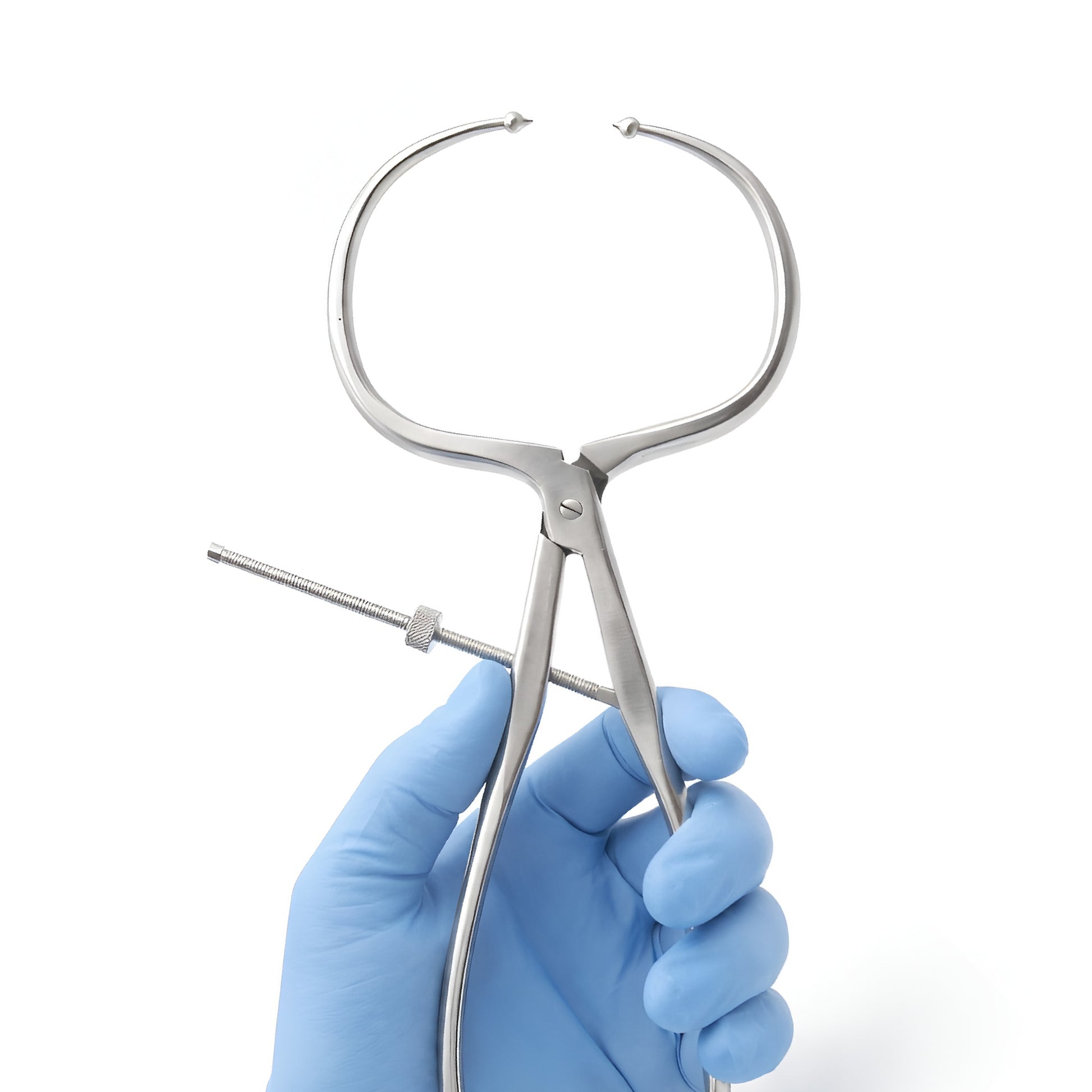 Surgical forceps held by a gloved hand on a white background