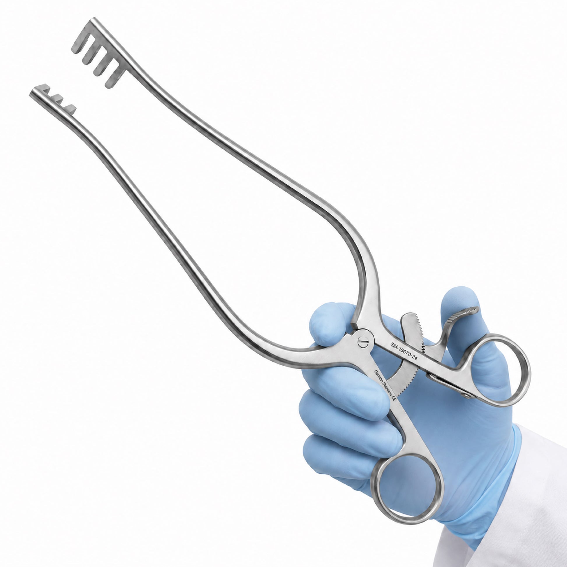 Surgical forceps held by a gloved hand on a white background