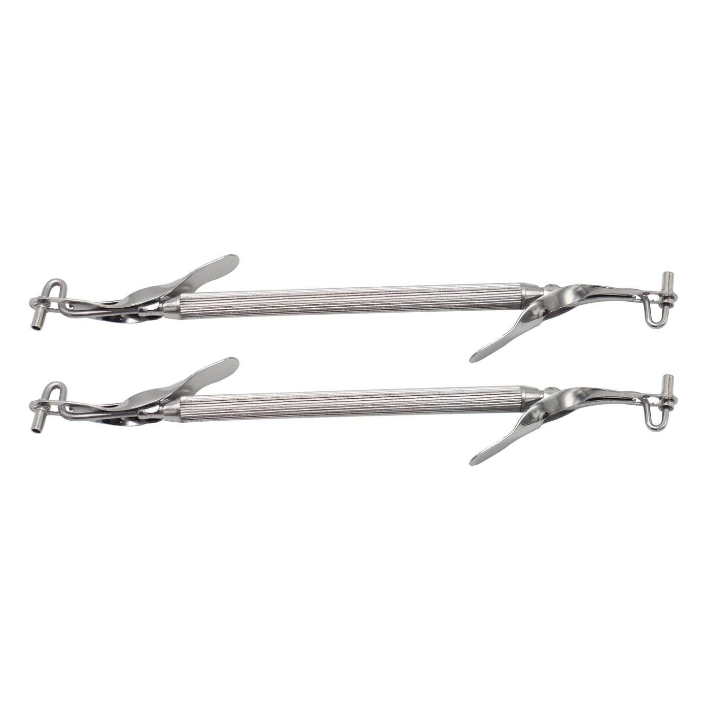 Two pairs of metal tongs on a white background