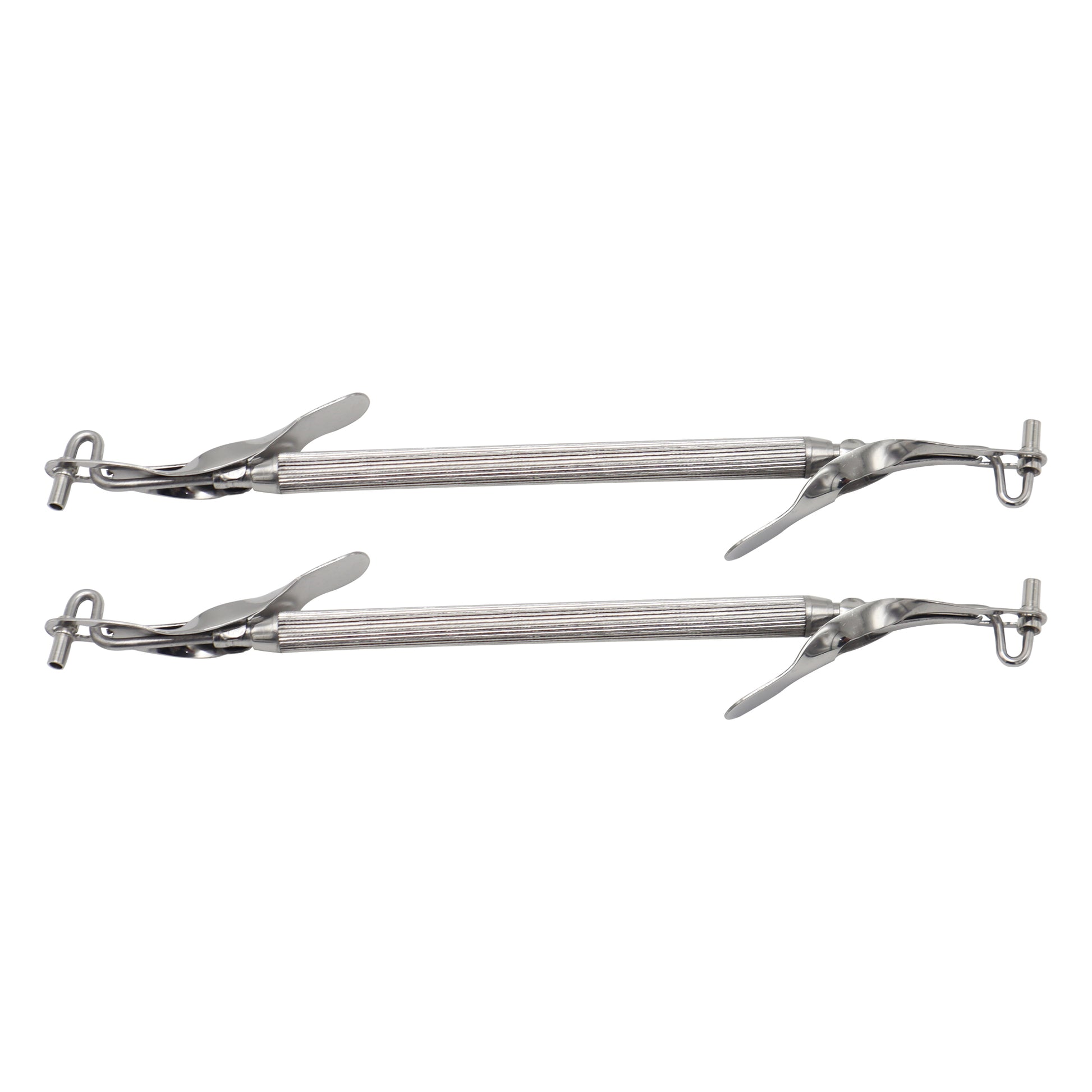 Two pairs of metal tongs on a white background