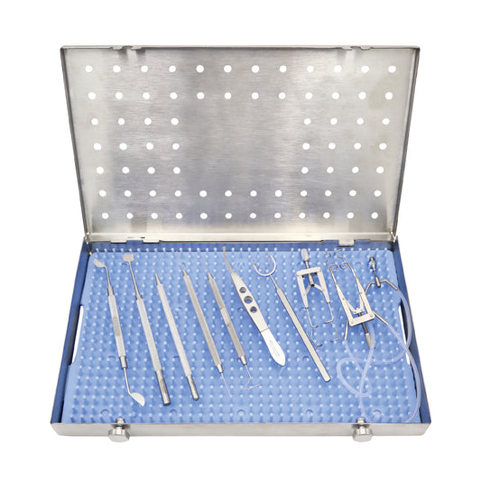 A 12-piece ophthalmic surgical instrument kit for cataract or LASIK procedures, organized in a perforated stainless steel sterilization tray with a blue silicone mat.