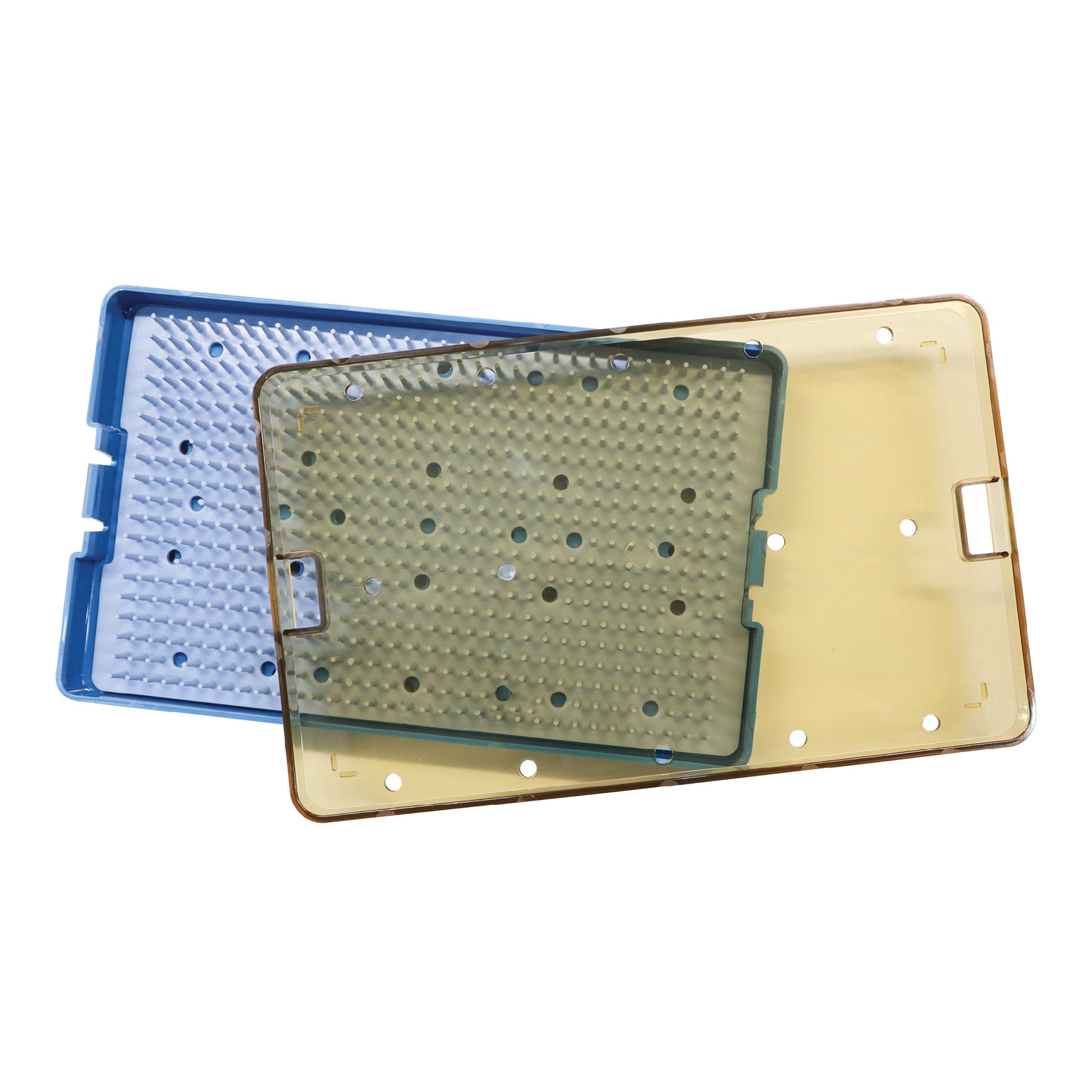 A blue and yellow medical sterilization tray set featuring a perforated lid and a spiked silicone mat designed to hold surgical instruments.