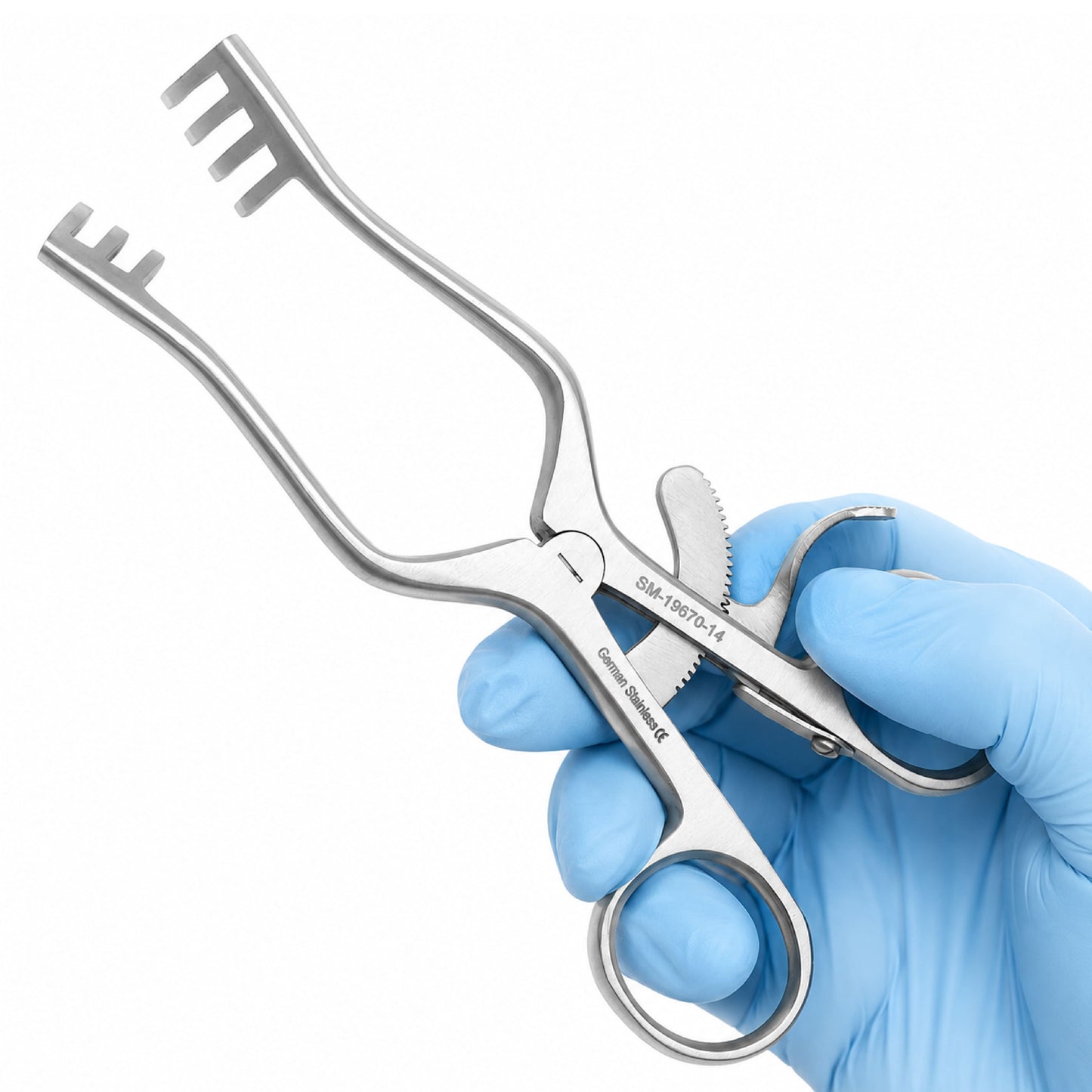A stainless steel medical clamp or forceps tool with a blue gloved hand holding it, shown against a plain white background.