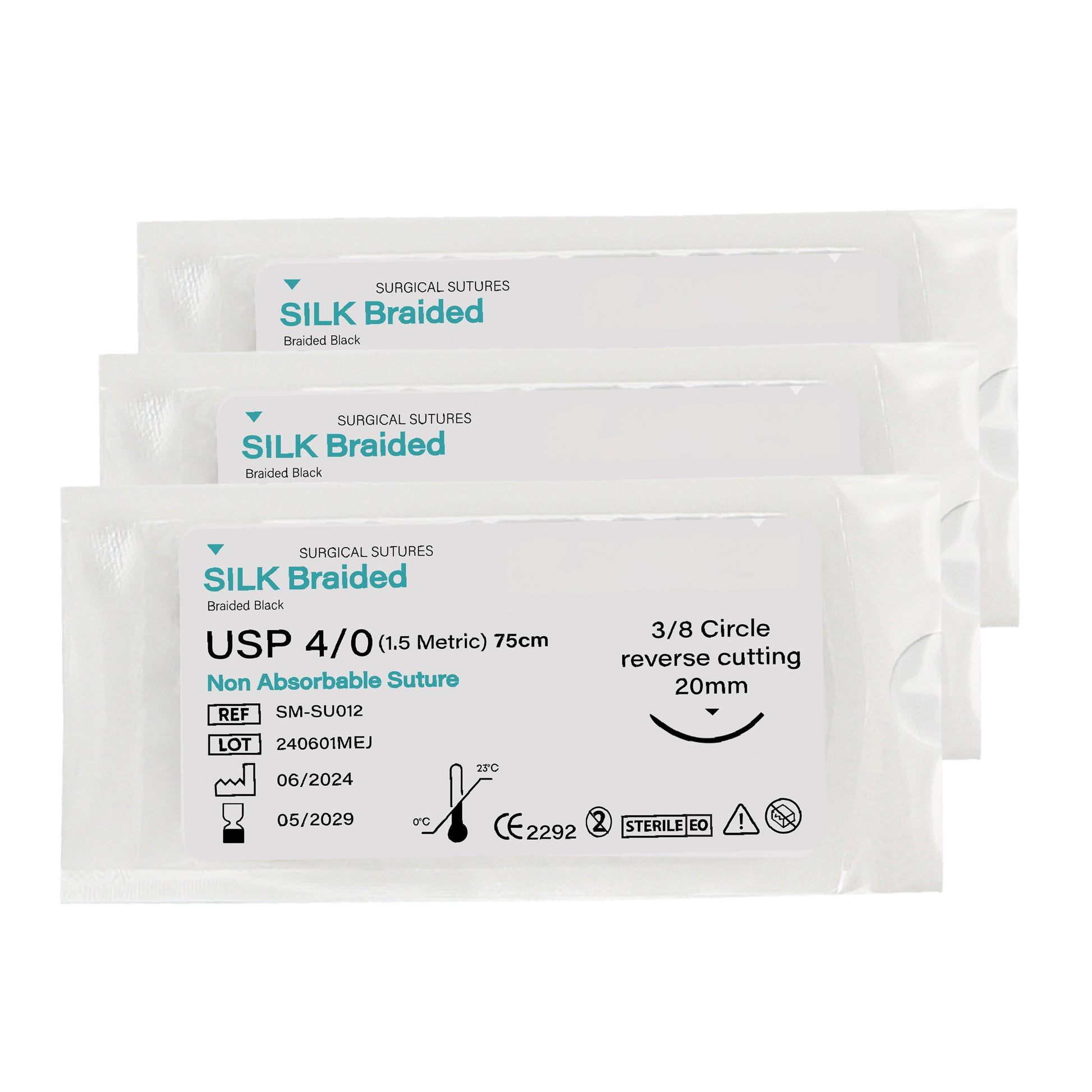 Three packages of Silk Braided surgical sutures on a white background